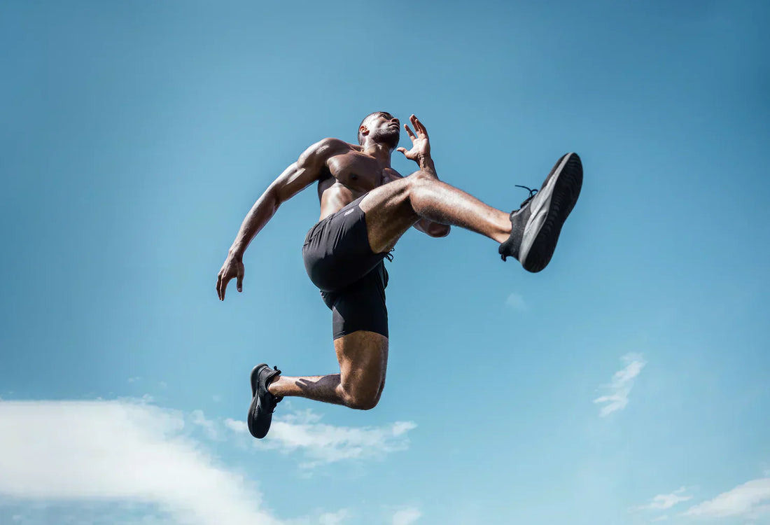 Athlete leaps up into the sky.