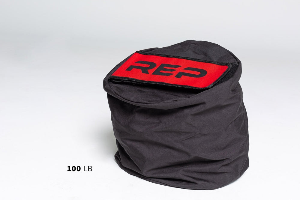 100lb Stone Sandbag - heavy-duty, triple-stitched sandbags with reinforced seams and zipper for strength exercises like stone carries, cleans, presses, and squats. Available in 50lb, 75lb, 100lb, 150lb, 200lb and 250lb adjustable sizes from Rep Fitness UK | Shop Premium Gym Equipment for Home & Commercial Use, Best Online Gym Equipment UK