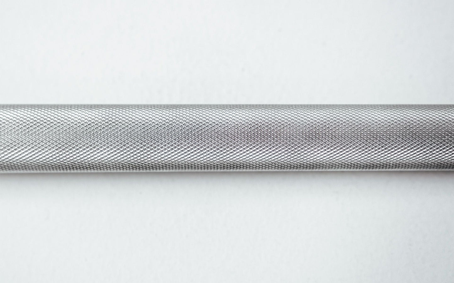 Close Up of Knurling Texture on the 48'' Solid Lat Bar from Rep Fitness UK | Shop Best Premium Gym Equipment for Home & Commercial Use Online