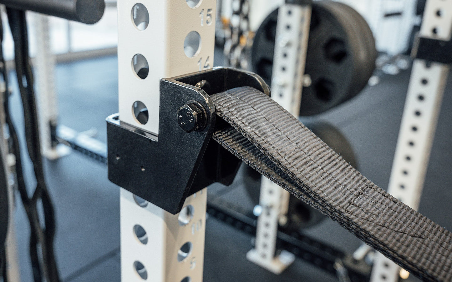 5000 Series Strap Safeties 2.0 Close Up Side view of Bracket and Strap, heavy-duty reinforced nylon safety straps for PR-5000, Omni, and 1000 Series power racks; ultra-durable, barbell-protecting, noise-reducing design with 1,000lb capacity, adjustable height ends, and patent-pending anti-rotation brackets for safe and versatile strength training from Rep Fitness UK | Shop Premium Gym Equipment for Home & Commercial Use, Best Online Gym Equipment