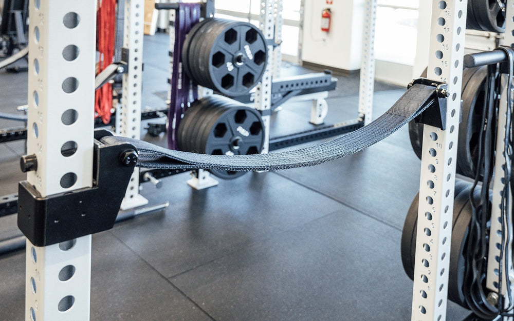 5000 Series Strap Safeties 2.0 on PR-5000 Power Rack, heavy-duty, reinforced nylon safety straps for PR-5000, Omni, and 1000 Series power racks; ultra-durable, barbell-protecting, noise-reducing design with 1,000lb capacity, adjustable height ends, and patent-pending anti-rotation brackets for safe and versatile strength training from Rep Fitness UK | Shop Premium Gym Equipment for Home & Commercial Use, Best Online Gym Equipment