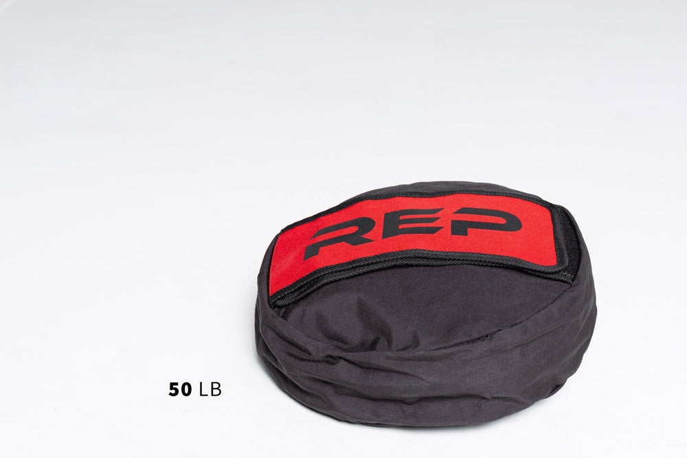 50lb Stone Sandbag - heavy-duty, triple-stitched sandbags with reinforced seams and zipper for strength exercises like stone carries, cleans, presses, and squats. Available in 50lb, 75lb, 100lb, 150lb, 200lb and 250lb adjustable sizes from Rep Fitness UK | Shop Premium Gym Equipment for Home & Commercial Use, Best Online Gym Equipment UK