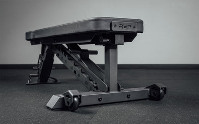 AB-4100 Adjustable Weight Bench close up of branding details and ladder from Rep Fitness UK | Shop Best Premium Gym Equipment for Home & Commercial Use Online