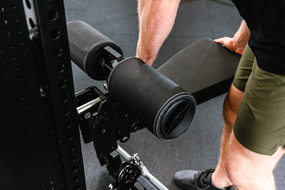 Man adjusting seat pad on Pegasus™ Attachment added to Adonis from Rep Fitness UK | Shop Premium Gym Equipment for Home & Commercial Use, Best Online Gym Equipment UK