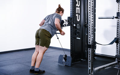 man doing arm exercises leaning against Pegasus™ Attachment added to Adonis from Rep Fitness UK | Shop Premium Gym Equipment for Home & Commercial Use, Best Online Gym Equipment UK