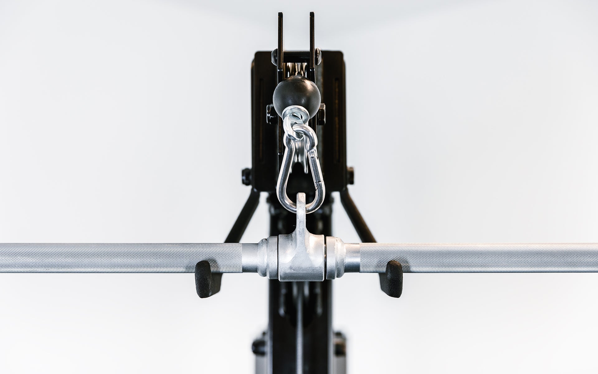 Adonis™ Cable Tower. Close up of hooks at the top to hold attachment, Adonis™ Cable Tower plate loaded, Selectorized with base support, premium space-saving cable machine for home or commercial gyms, 1:1 and 2:1 pulley ratios, 34 cable positions, and compatibility with REP’s 5000 Series racks, Pegasus™ attachment, and Modular Storage System for unmatched versatility and performance from Rep Fitness UK | Shop Premium Gym Equipment for Home & Commercial Use, Best Online Gym Equipment UK