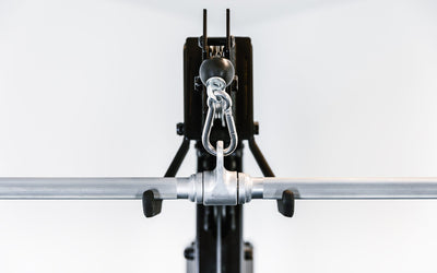 Adonis™ Cable Tower. Close up of hooks at the top to hold attachment, Adonis™ Cable Tower plate loaded, Selectorized with base support, premium space-saving cable machine for home or commercial gyms, 1:1 and 2:1 pulley ratios, 34 cable positions, and compatibility with REP’s 5000 Series racks, Pegasus™ attachment, and Modular Storage System for unmatched versatility and performance from Rep Fitness UK | Shop Premium Gym Equipment for Home & Commercial Use, Best Online Gym Equipment UK