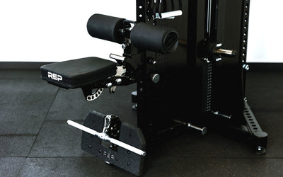 Adonis™ Cable Tower shown with Pegasus™ Attachment, plate loaded, Selectorized with base support, premium space-saving cable machine for home or commercial gyms, 1:1 and 2:1 pulley ratios, 34 cable positions, and compatibility with REP’s 5000 Series racks, Pegasus™ attachment, and Modular Storage System for unmatched versatility and performance from Rep Fitness UK | Shop Premium Gym Equipment for
