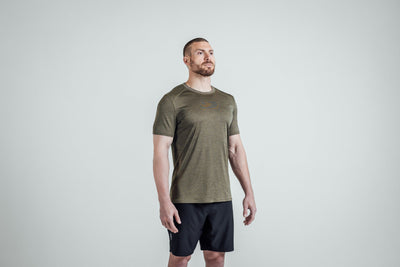 Athlete wearing Heather Olive Sigmatech Shirt