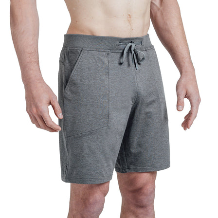 Studio shot: Athlete wearing REP’s Men’s Apollo Shorts with a 9 inch inseam in Heather Cool Gray/Black
