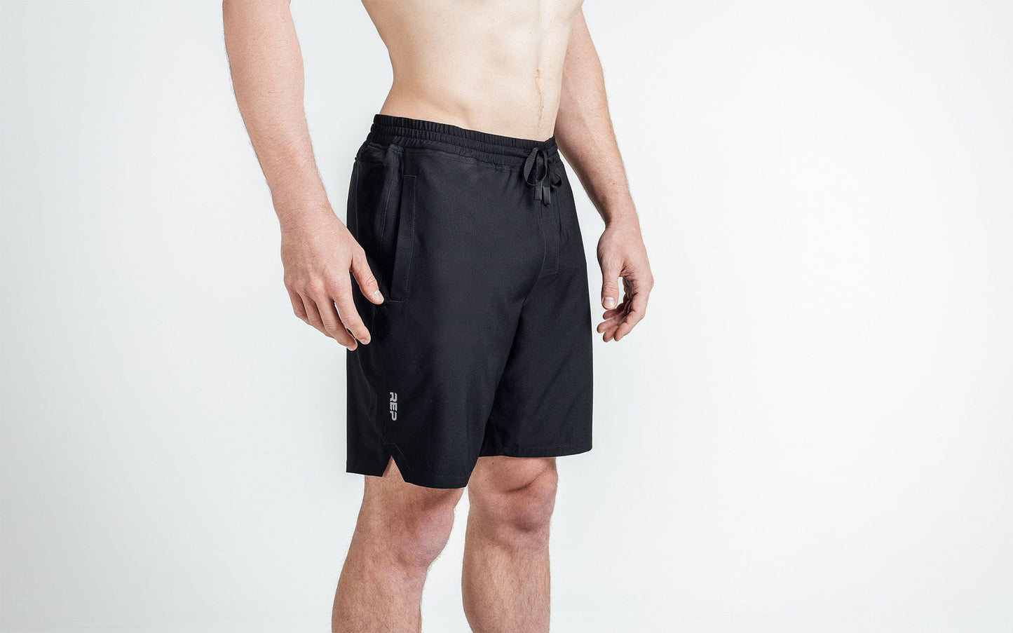 Athlete wearing black Men's Motus Shorts