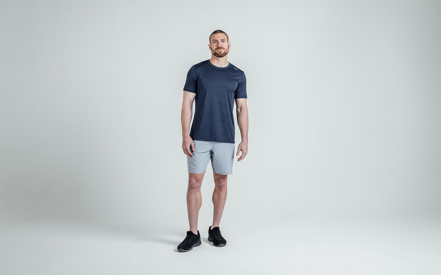 Athlete wearing silver Men's Motus Shorts