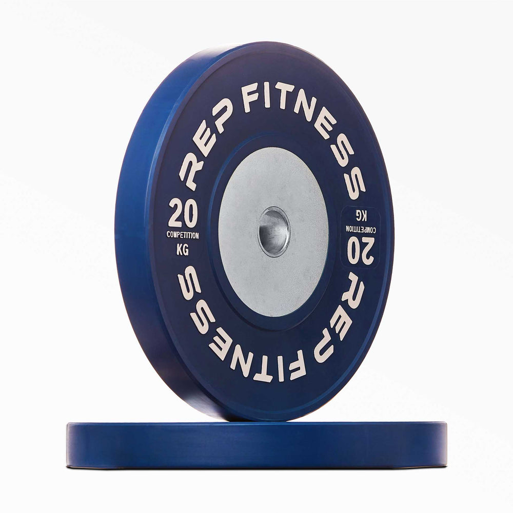 Blue 20kg Competition Bumper Plate Pair. REP Competition Bumper Plates are premium colour-coded KG Olympic weightlifting plates designed for low bounce, ultra-durability, and repeated drops from overhead from Rep Fitness UK | Shop Premium Gym Equipment for Home & Commercial Use Online | Best Online Gym Equipment UK