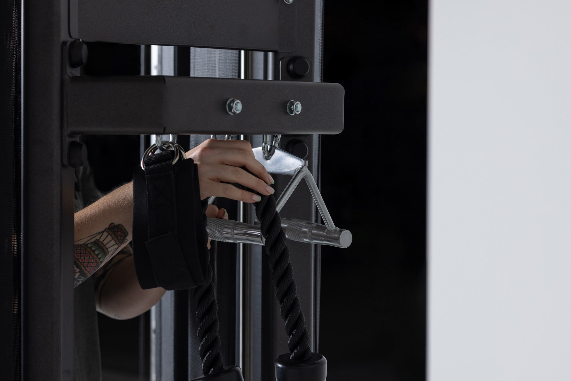  Triangle Row Cable Attachment Shown Hanging From Functional Trainer Storage from Rep Fitness UK | Shop Best Premium Gym Equipment for Home & Commercial Use Online