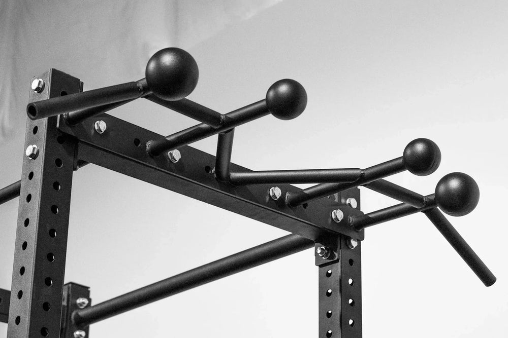 Close-up of attached Globe Front Mount Pull-Up Bar, versatile attachment for multiple grips with 1.25” tubes, small (3.1”) and large (4”) globes for grip training, band attachment options, matte black powder coat, space-saving home gym pull-up station from Rep Fitness UK | Shop Premium Gym Equipment for Home & Commercial Use, Best Online Gym Equipment UK