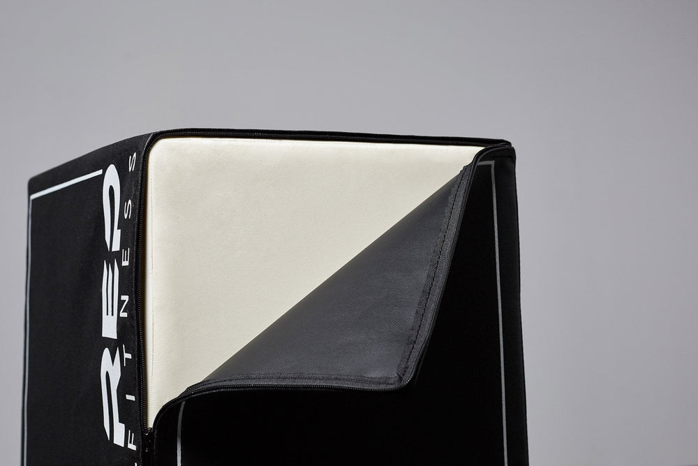 Close-up of unzipped 3-in-1 Soft Plyo Box showing inside material for safe plyometric training featuring a wood-core interior, impact-absorbing foam, non-slip textured vinyl, and clearly labeled height option for box jumps in home or garage gyms from Rep Fitness UK | Shop Premium Gym Equipment for Home & Commercial Use
