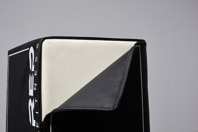 Close-up of unzipped 3-in-1 Soft Plyo Box showing inside material for safe plyometric training featuring a wood-core interior, impact-absorbing foam, non-slip textured vinyl, and clearly labeled height option for box jumps in home or garage gyms from Rep Fitness UK | Shop Premium Gym Equipment for Home & Commercial Use
