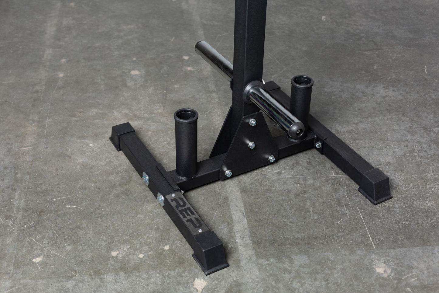 Close-up view of the bottom section of the REP Bar and Weight Plate Tree showing the bottom weight horns and the two barbell holders, Bar and Weight Plate Tree, heavy-duty storage tree rack for organized gym equipment storage and easy access in home and commercial fitness spaces from  Rep Fitness UK | Shop Premium Gym Equipment for Home & Commercial Use Online | Best Gym Equipment UK