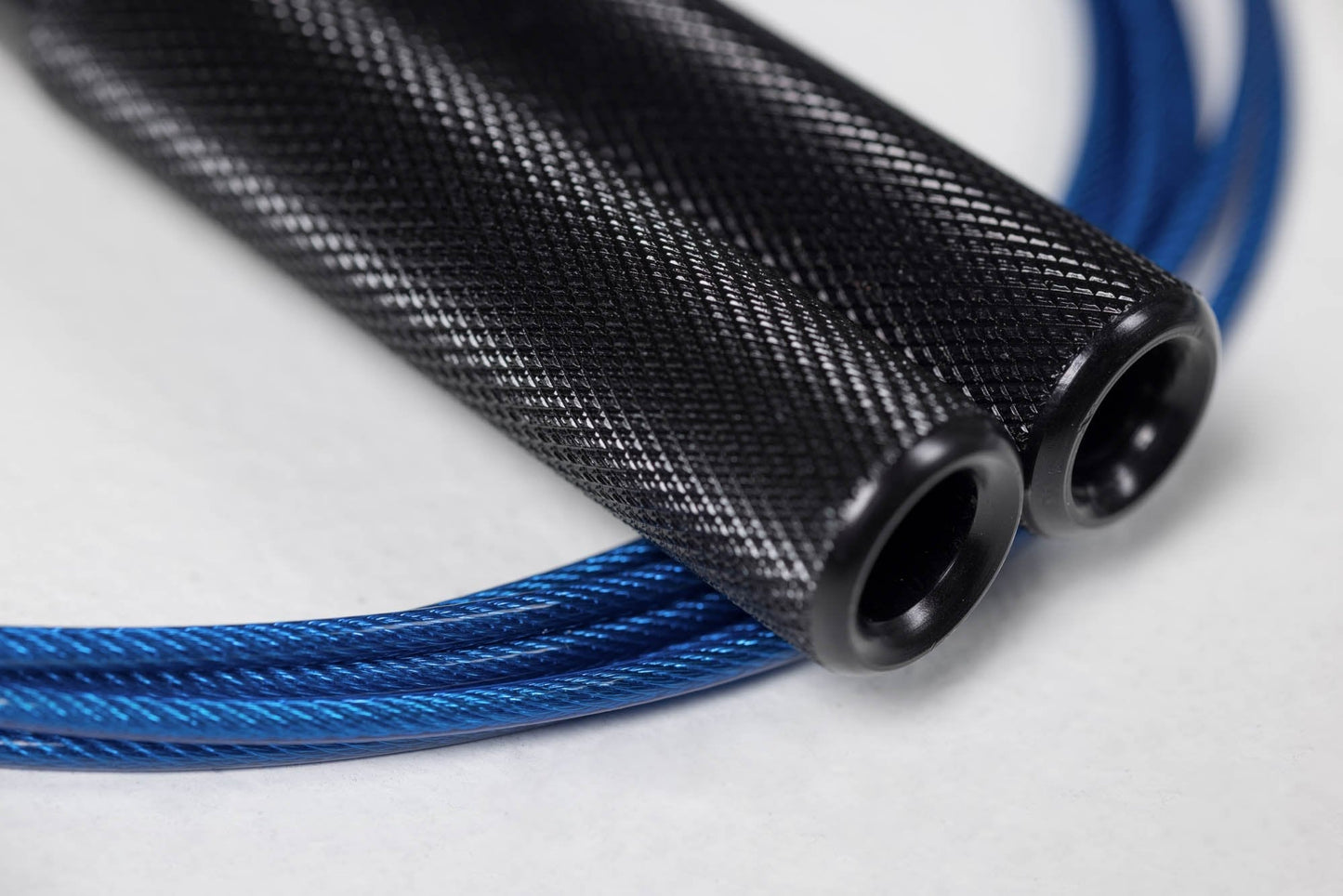 Competition Speed Rope Close Up of Black Handles and Knurl from Rep Fitness UK | Shop Best Premium Gym Equipment for Home & Commercial Use Online