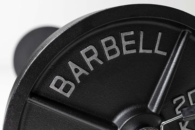 Close up view of the word "BARBELL" in silver lettering on a 45lb Old School Iron Plate from Rep Fitness UK | Shop Best Premium Gym Equipment for Home & Commercial Use Online