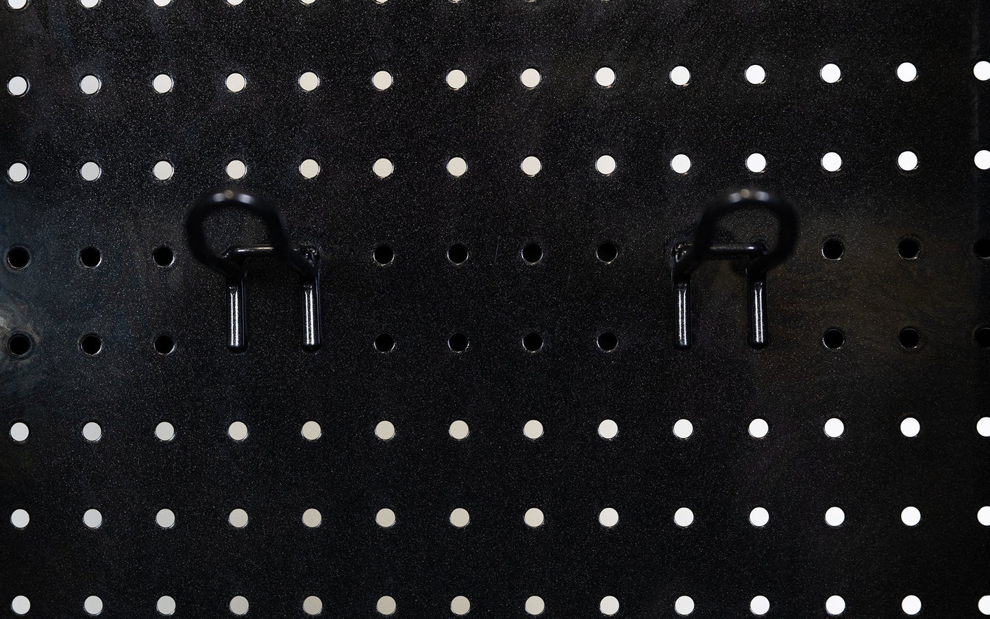 Close-up of pegboard storage hooks on Arcadia Functional Trainer from Rep Fitness UK | Shop Best Premium Gym Equipment for Home & Commercial Use Online