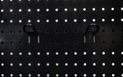 Close-up of pegboard storage hooks on Arcadia Functional Trainer from Rep Fitness UK | Shop Best Premium Gym Equipment for Home & Commercial Use Online