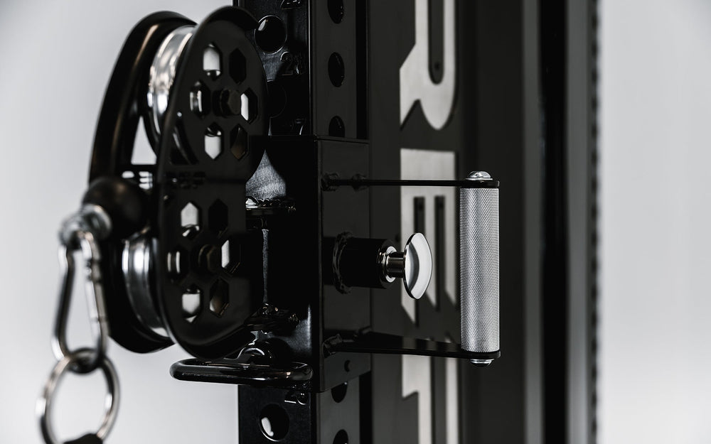 Close up of Adonis™ Cable Tower plate loaded, Selectorized with base support, premium space-saving cable machine for home or commercial gyms, 1:1 and 2:1 pulley ratios, 34 cable positions, and compatibility with REP’s 5000 Series racks, Pegasus™ attachment, and Modular Storage System for unmatched versatility and performance from Rep Fitness UK | Shop Premium Gym Equipment for Home & Commercial Use, Best Online Gym Equipment