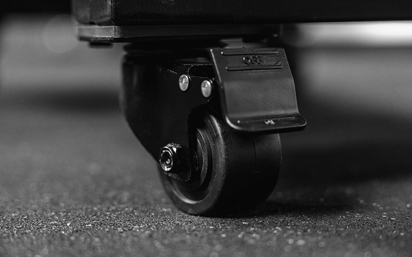 Close up of high-capacity caster wheel on heavy-duty multipurpose cart  storage solution in sleek matte black metal finish for organized gym equipment storage from Rep Fitness UK | Shop Premium Gym Equipment for Home & Commercial Use Online