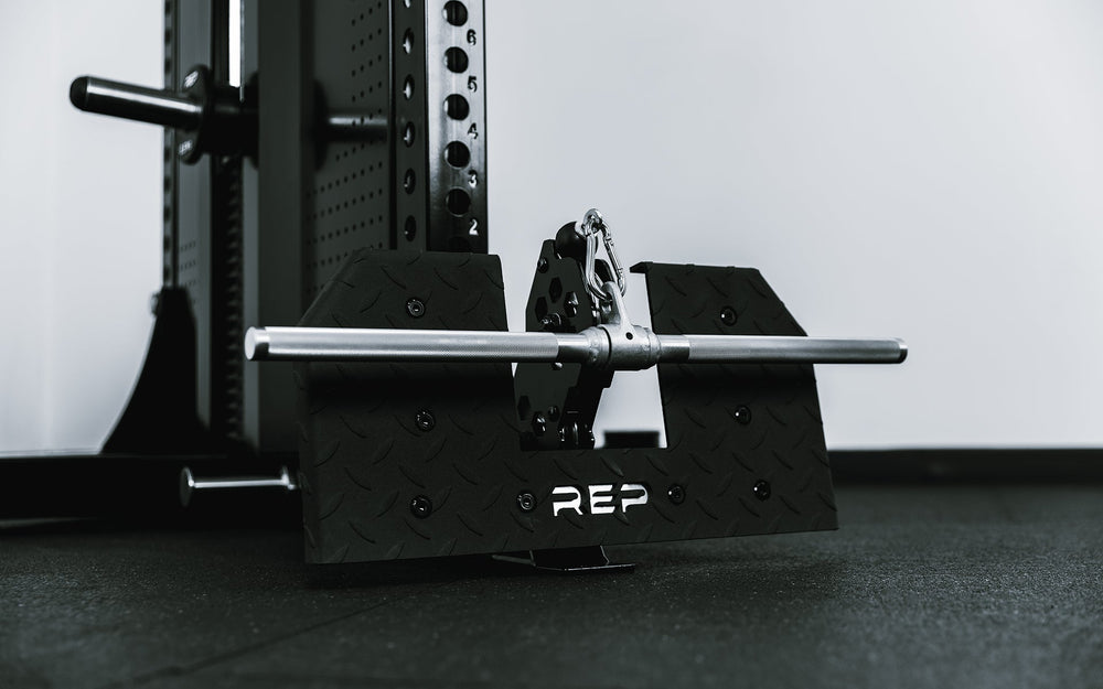 Close up of selectorized weight handle on Adonis™ Cable Tower plate loaded, Selectorized with base support, premium space-saving cable machine for home or commercial gyms, 1:1 and 2:1 pulley ratios, 34 cable positions, and compatibility with REP’s 5000 Series racks, Pegasus™ attachment, and Modular Storage System for unmatched versatility and performance from Rep Fitness UK | Shop Premium Gym Equipment for Home & Commercial Use, Best Online Gym Equipment