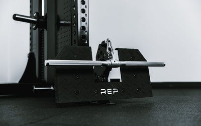Close up of selectorized weight handle on Adonis™ Cable Tower plate loaded, Selectorized with base support, premium space-saving cable machine for home or commercial gyms, 1:1 and 2:1 pulley ratios, 34 cable positions, and compatibility with REP’s 5000 Series racks, Pegasus™ attachment, and Modular Storage System for unmatched versatility and performance from Rep Fitness UK | Shop Premium Gym Equipment for Home & Commercial Use, Best Online Gym Equipment