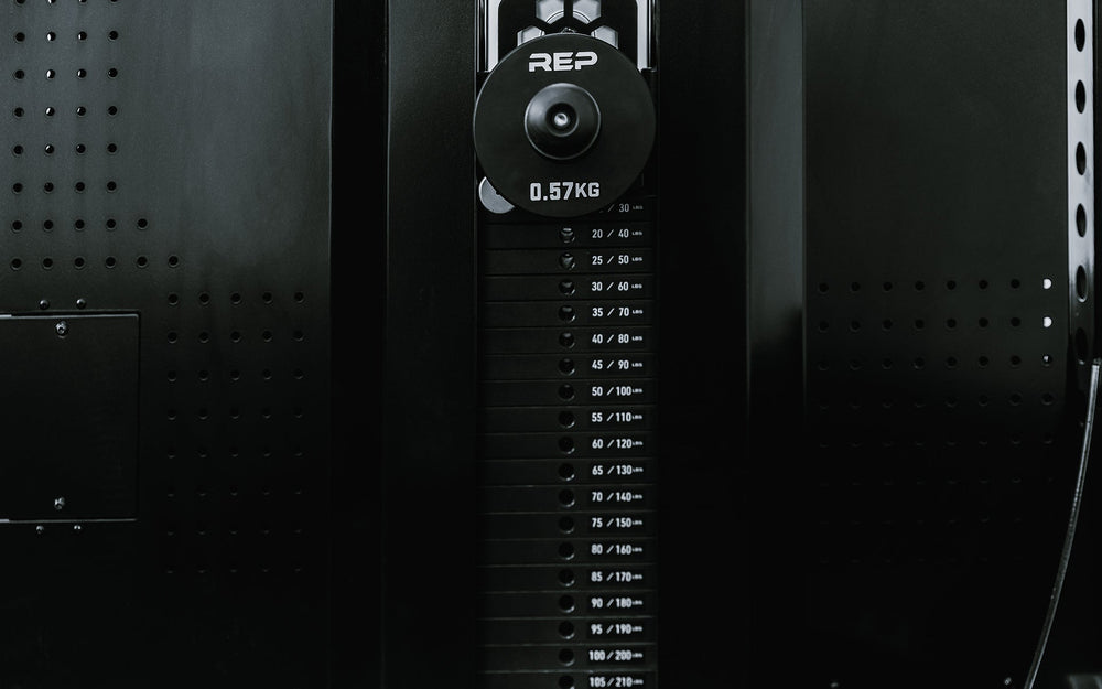 Close up of selectorized weight settings on Adonis™ Cable Tower plate loaded, Selectorized with base support, premium space-saving cable machine for home or commercial gyms, 1:1 and 2:1 pulley ratios, 34 cable positions, and compatibility with REP’s 5000 Series racks, Pegasus™ attachment, and Modular Storage System for unmatched versatility and performance from Rep Fitness UK | Shop Premium Gym Equipment for Home & Commercial Use, Best Online Gym Equipment
