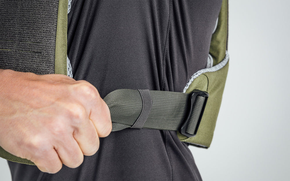 Close up of the side slide-lock hardware on the Strata Weight Vest, adjustable fit, padded ergonomic design, durable 750D Cordura®, secure plate compartments, and versatile use for strength, HIIT, and functional fitness from Rep Fitness UK | Shop Premium Gym Equipment for Home & Commercial Use, Best Online Gym Equipment UK