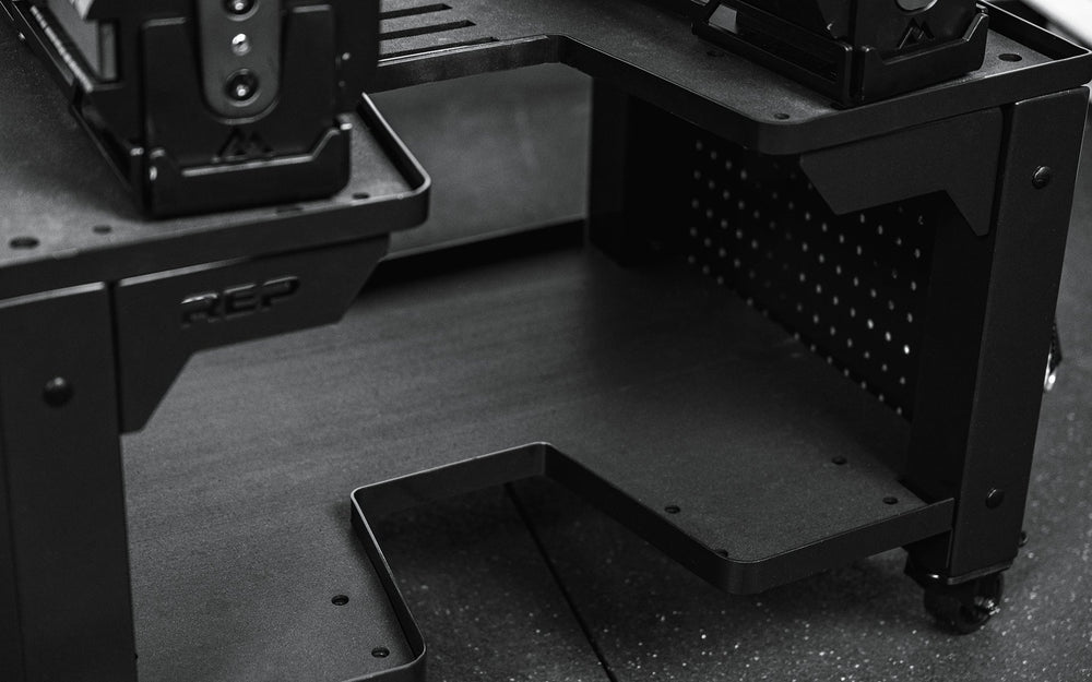 Closeup of bottom area of multipurpose metal storage cart in matte black for organized gym equipment storage from Rep Fitness UK | Shop Premium Gym Equipment for Home & Commercial Use Online