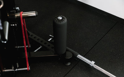 Closeup of leg roll on Adonis™ Cable Tower. Close up of hooks at the top to hold attachment, Adonis™ Cable Tower plate loaded, Selectorized with base support, premium space-saving cable machine for home or commercial gyms, 1:1 and 2:1 pulley ratios, 34 cable positions, and compatibility with REP’s 5000 Series racks, Pegasus™ attachment, and Modular Storage System for unmatched versatility and performance from Rep Fitness UK | Shop Premium Gym Equipment for Home & Commercial Use, Best Online Gym Equipment UK