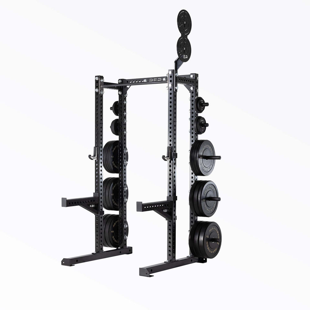Compact Logo Plate Crossmember Shown on power rack, heavy-duty 3x3” 11-gauge steel rack stabilizer with laser-cut holes, metallic black powder coat, and laser-engraved REP logo from Rep Fitness UK | Shop Premium Gym Equipment for Home & Commercial Use, Best Online Gym Equipment UK