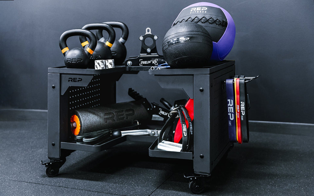 Dumbbell Storage Cart with pegboard storage hooks on the side.