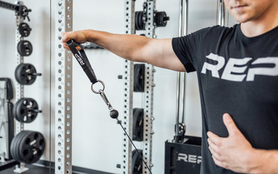 D-handle being used for cable side raise from Rep Fitness UK | Shop Best Premium Gym Equipment for Home & Commercial Use Online