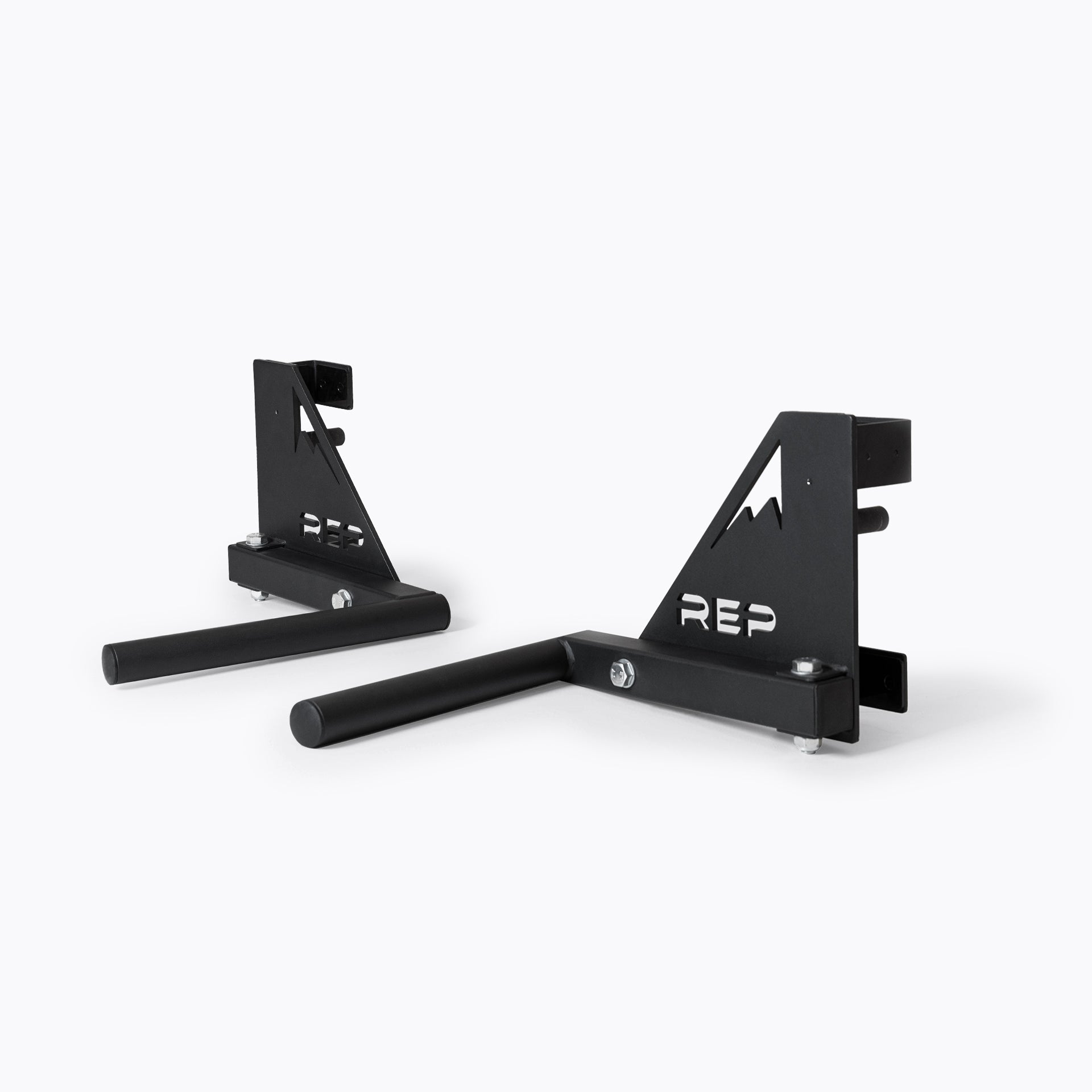 Drop-In Dip Attachment, heavy-duty 11-gauge steel dip handles for power racks; 810 lb capacity, double C-cup mounting for stability, plastic-lined brackets to protect uprights, matte black powder coat textured grips, and laser-cut REP mountain design for premium aesthetic from Rep Fitness UK | Shop Premium Gym Equipment for Home & Commercial Use, Best Online Gym Equipment