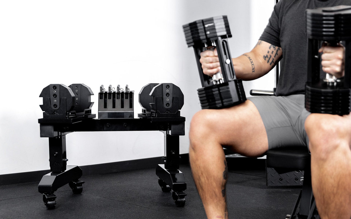 Dumbbell Stand Metallic Black front View with Extra Weights In Weight Add On Holder from_Rep_Fitness_UK_Shop_Premium_Gym_Equipment_for_Home_Commercial_Use_Online