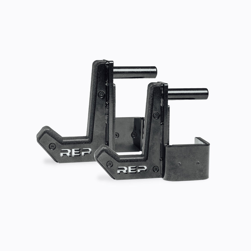 Flat Sandwich J-Cups 2.0 – heavy-duty 1,000 lb capacity barbell holders for PR-5000 power racks; 3x3” steel design with urethane and plastic protection, laser-cut REP logo plate, stainless-steel backing, metallic black powder coat, and wider opening for specialty bars from Rep Fitness UK | Shop Premium Gym Equipment for Home & Commercial Use, Best Online Gym Equipment UK