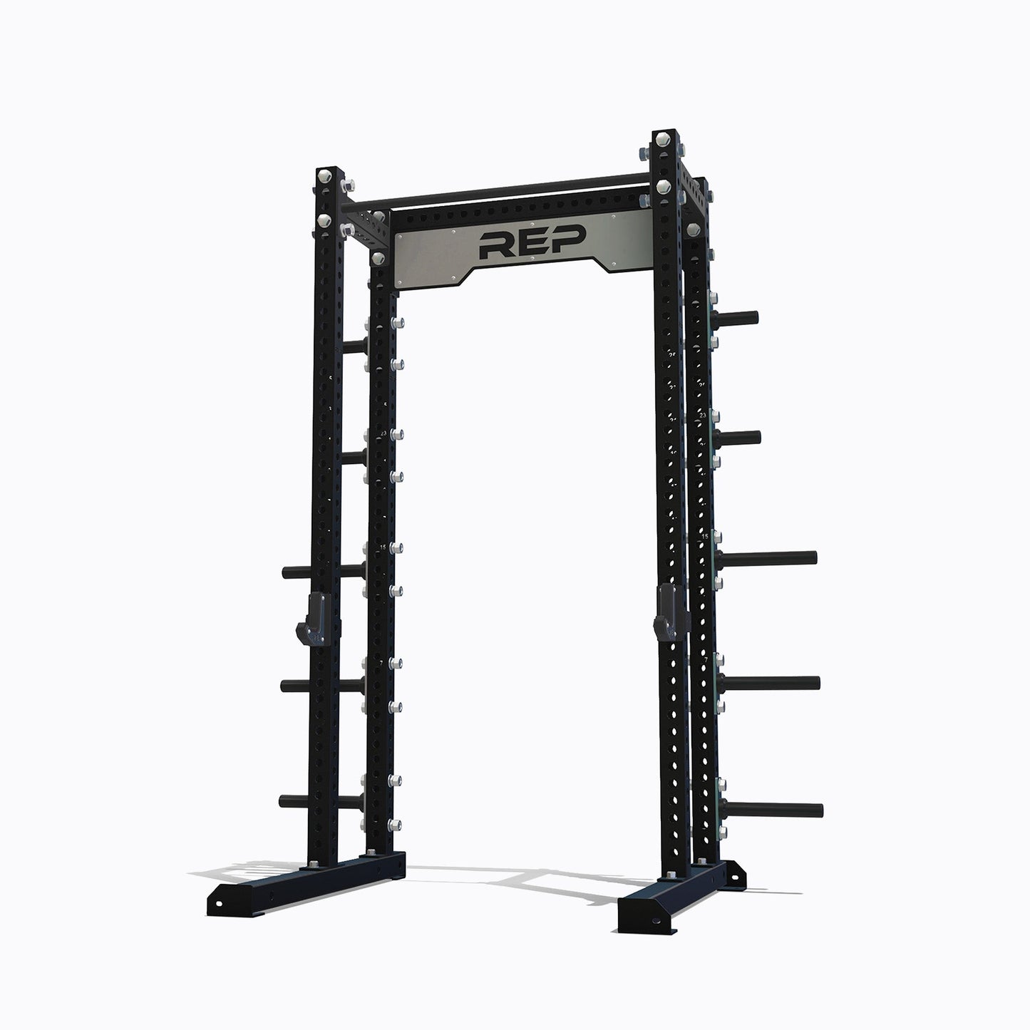 Black Apollo half rack builder  with pull-up bar and multiple weight plate storage pegs. This set is suitable for home or commercial gym strength training.