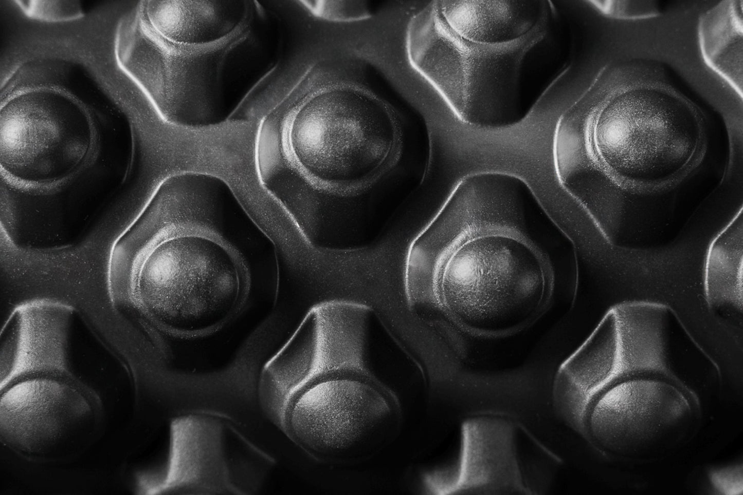 Close-up of Black "peak" texture on High Density Foam Roller from Rep Fitness UK | Shop Best Premium Gym Equipment for Home & Commercial Use Online