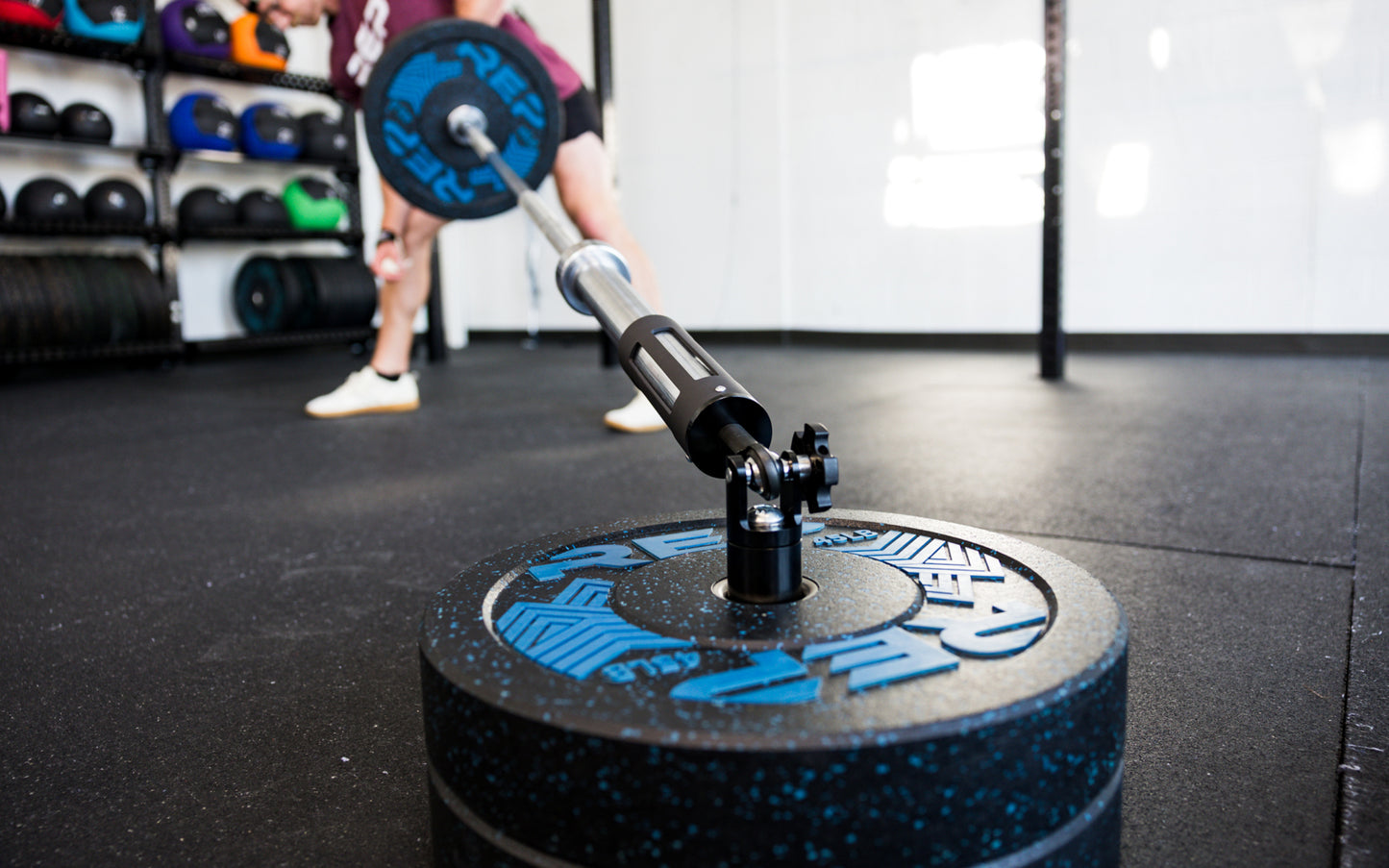 The Free Standing REP® x Kleva Built® Adroit Landmine being used by an athlete with REP's Pinnacle™ Plates from Rep Fitness UK | Shop Premium Gym Equipment for Home & Commercial Use Online | Best Online Gym Equipment UK