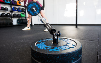 The Free Standing REP® x Kleva Built® Adroit Landmine being used by an athlete with REP's Pinnacle™ Plates from Rep Fitness UK | Shop Premium Gym Equipment for Home & Commercial Use Online | Best Online Gym Equipment UK
