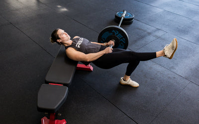 An athlete working out with the Free Standing REP® x Kleva Built® Adroit Landmine and a REP adjustable bench from Rep Fitness UK | Shop Premium Gym Equipment for Home & Commercial Use Online | Best Online Gym Equipment UK
