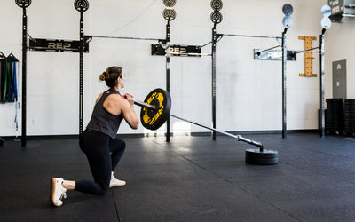 An athlete performing lunges with the Free Standing REP® x Kleva Built® Adroit Landmine from Rep Fitness UK | Shop Premium Gym Equipment for Home & Commercial Use Online | Best Online Gym Equipment UK