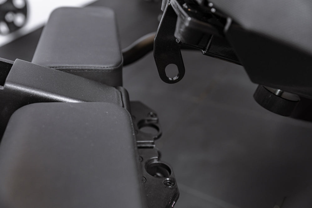 Close up of the Leg Extension & Leg Curl Bench Attachment adapter