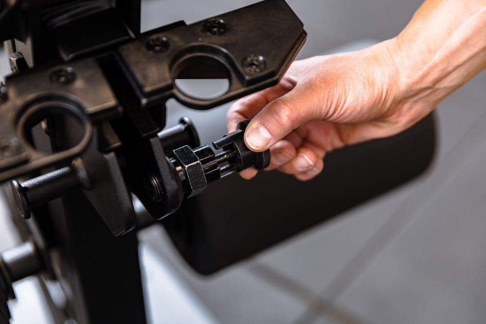 Close up of the Leg Extension & Leg Curl Bench Attachment lock-pin