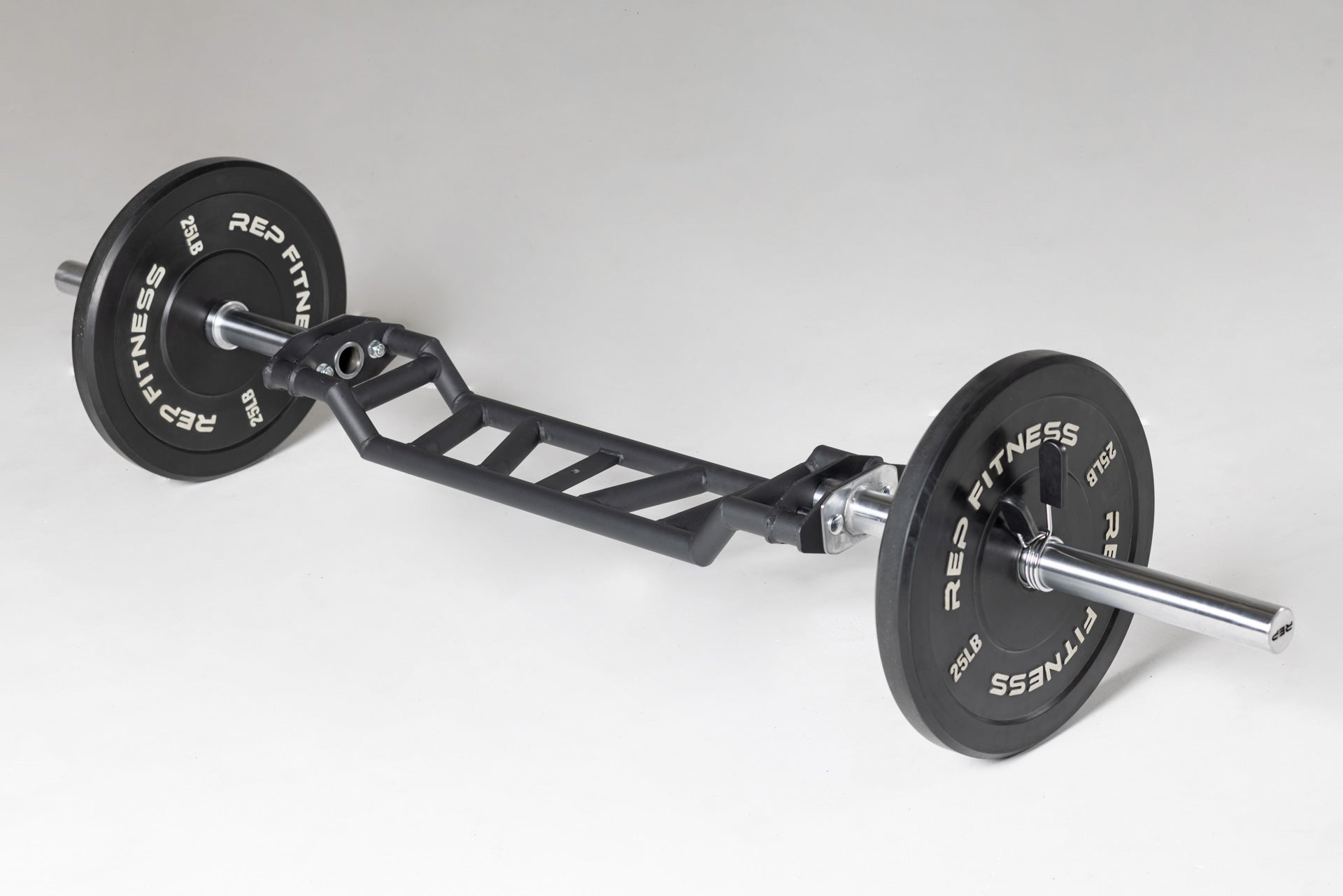 Loaded Cambered Swiss Bar, premium chrome sleeve with REP logo, versatile multi-grip barbell with cambered design for greater range of motion and muscle engagement; features moderate knurling, round tubing for comfort, removable eyebolt for cable attachments, standard collar compatibility, and premium construction for advanced strength training from Rep Fitness UK | Shop Premium Gym Equipment for Home & Commercial Use, Best Online Gym Equipment