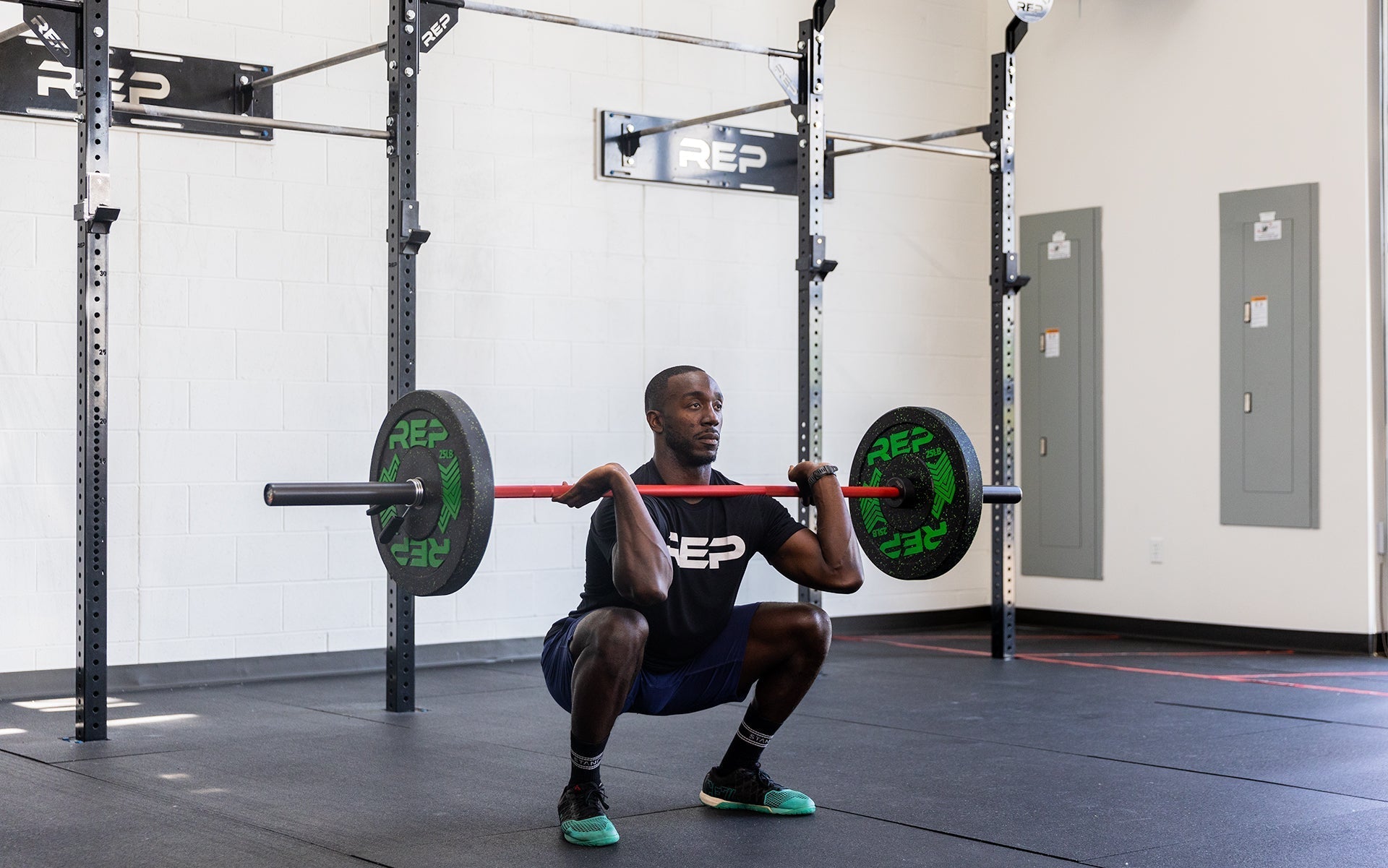Man using 20 kg Colorado Bar weightlifting bar for powerlifting, ideal for strength training and gym workouts from Rep Fitness UK | Shop Premium Gym Equipment for Home & Commercial Use Online
